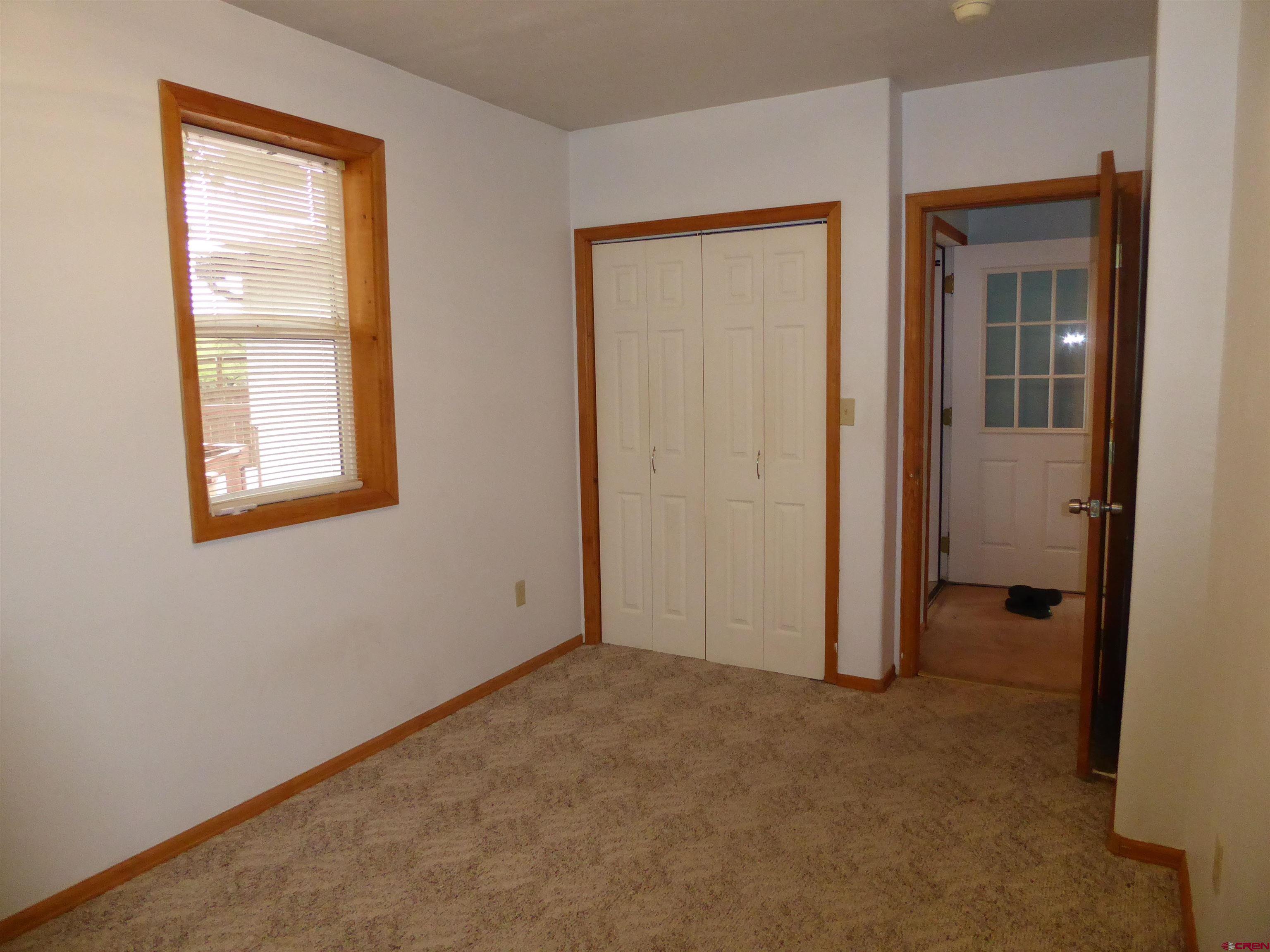 180 Northwest 7th Street Cedaredge, CO 81413 - Photo 39 of 44 an empty room that has a window