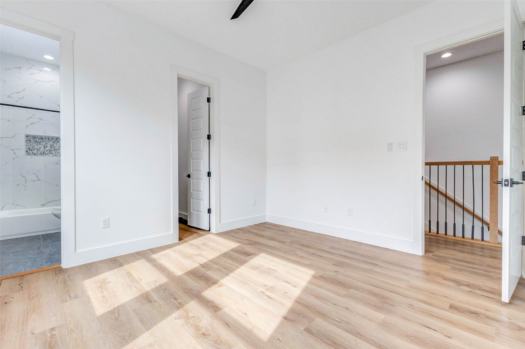 2118 Live Oak Street, Unit B Houston, TX 77003 - Photo 23 of 50 A bright secondary bedroom with an easy, open feel and a full bath just steps away. Clean lines and natural light make the space feel comfortable, polished, and ready to use however you need.