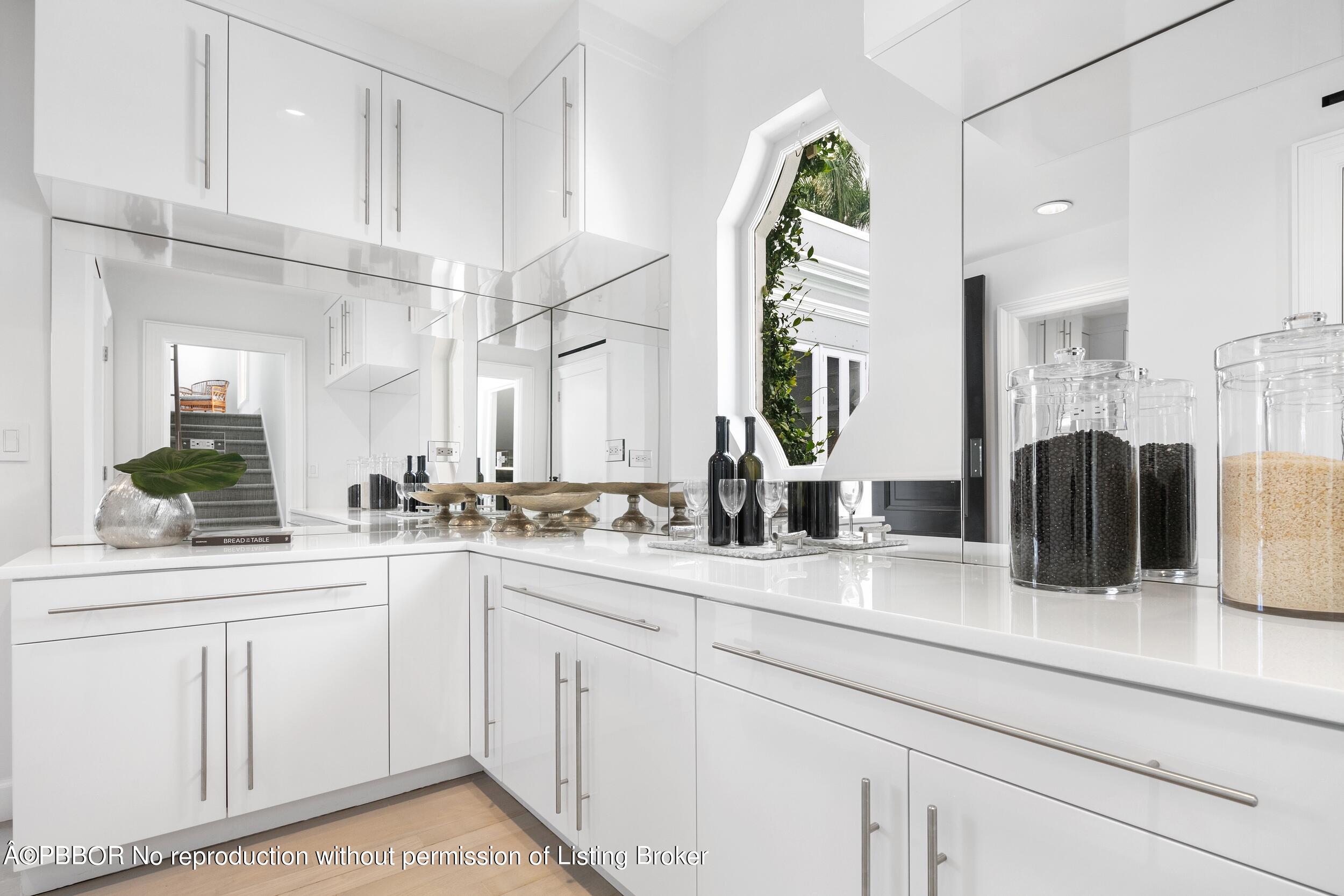 301 Polmer Park Road Palm Beach, FL 33480 - Photo 15 of 43 a bathroom with a sink and a mirror