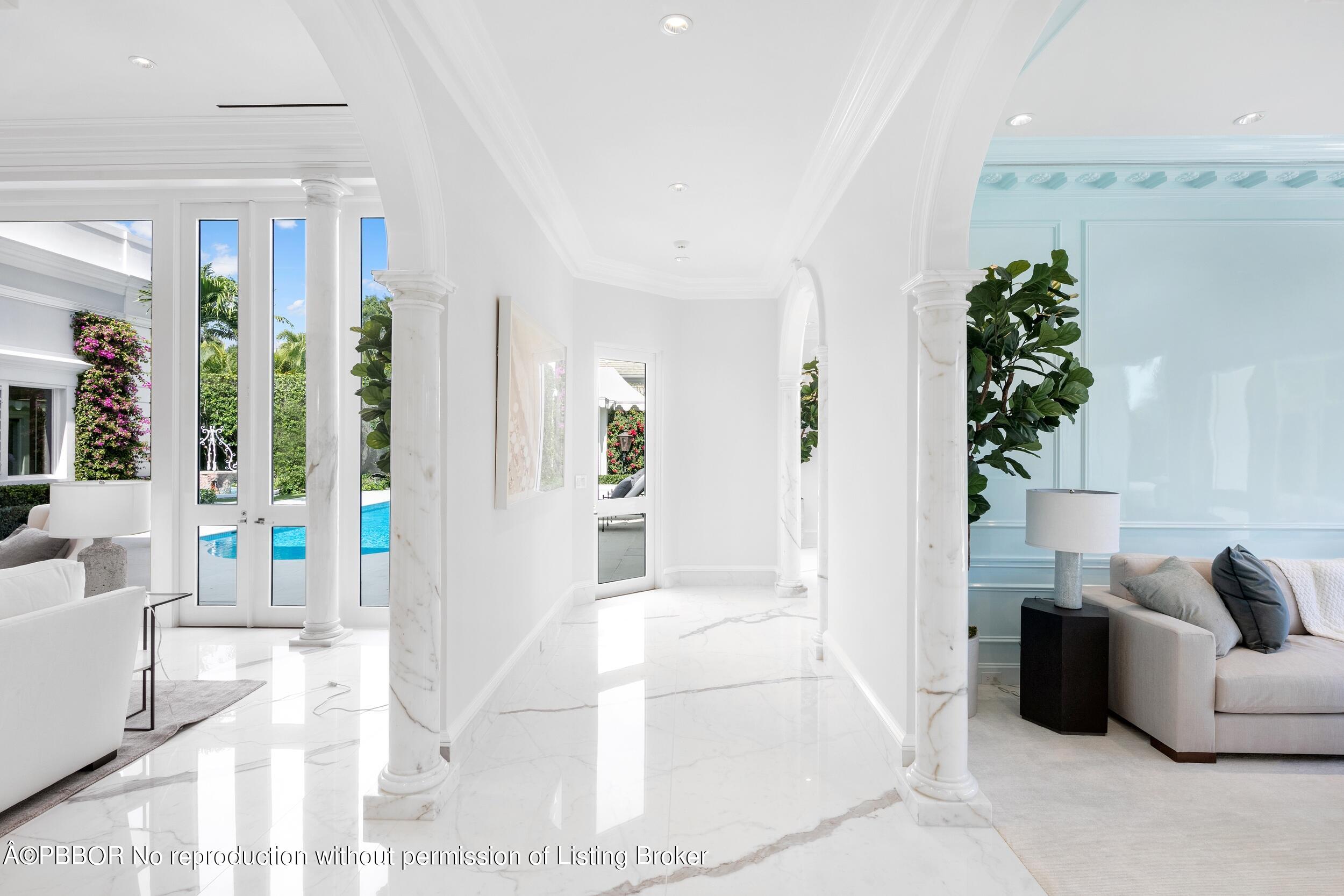 301 Polmer Park Road Palm Beach, FL 33480 - Photo 17 of 43 a living room with furniture and a potted plant