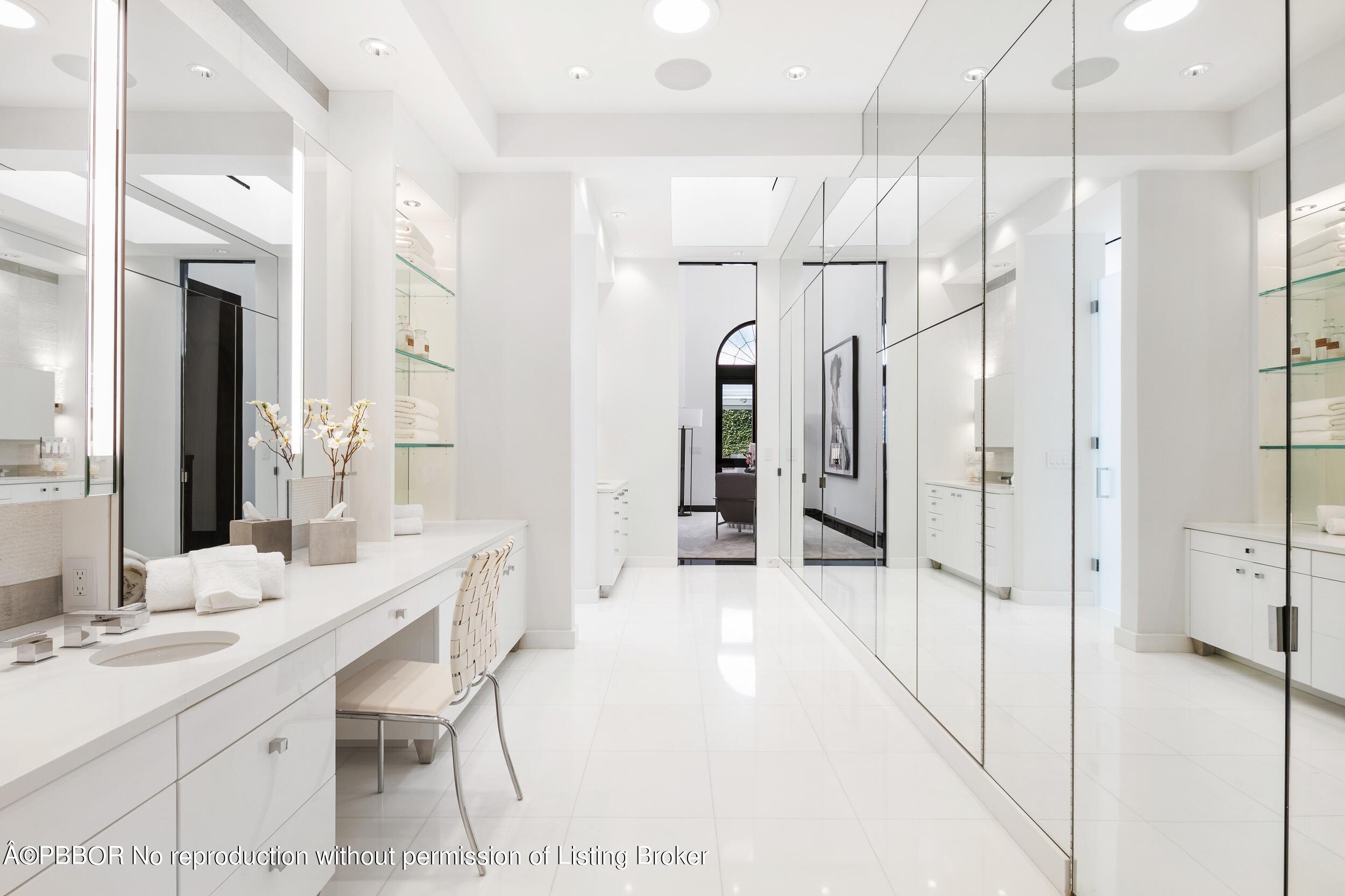 301 Polmer Park Road Palm Beach, FL 33480 - Photo 29 of 43 a large bathroom with a double vanity sink mirror and shower