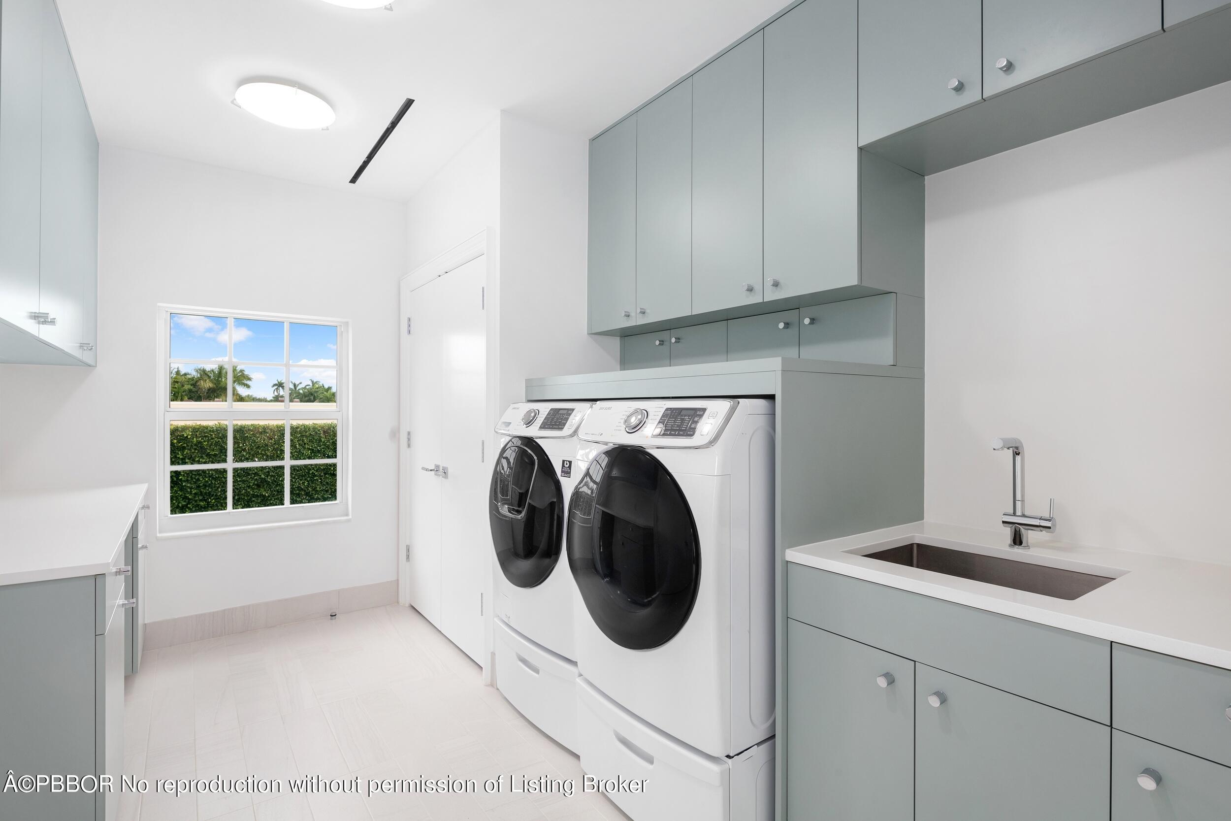 301 Polmer Park Road Palm Beach, FL 33480 - Photo 31 of 43 a utility room with sink dryer and washer