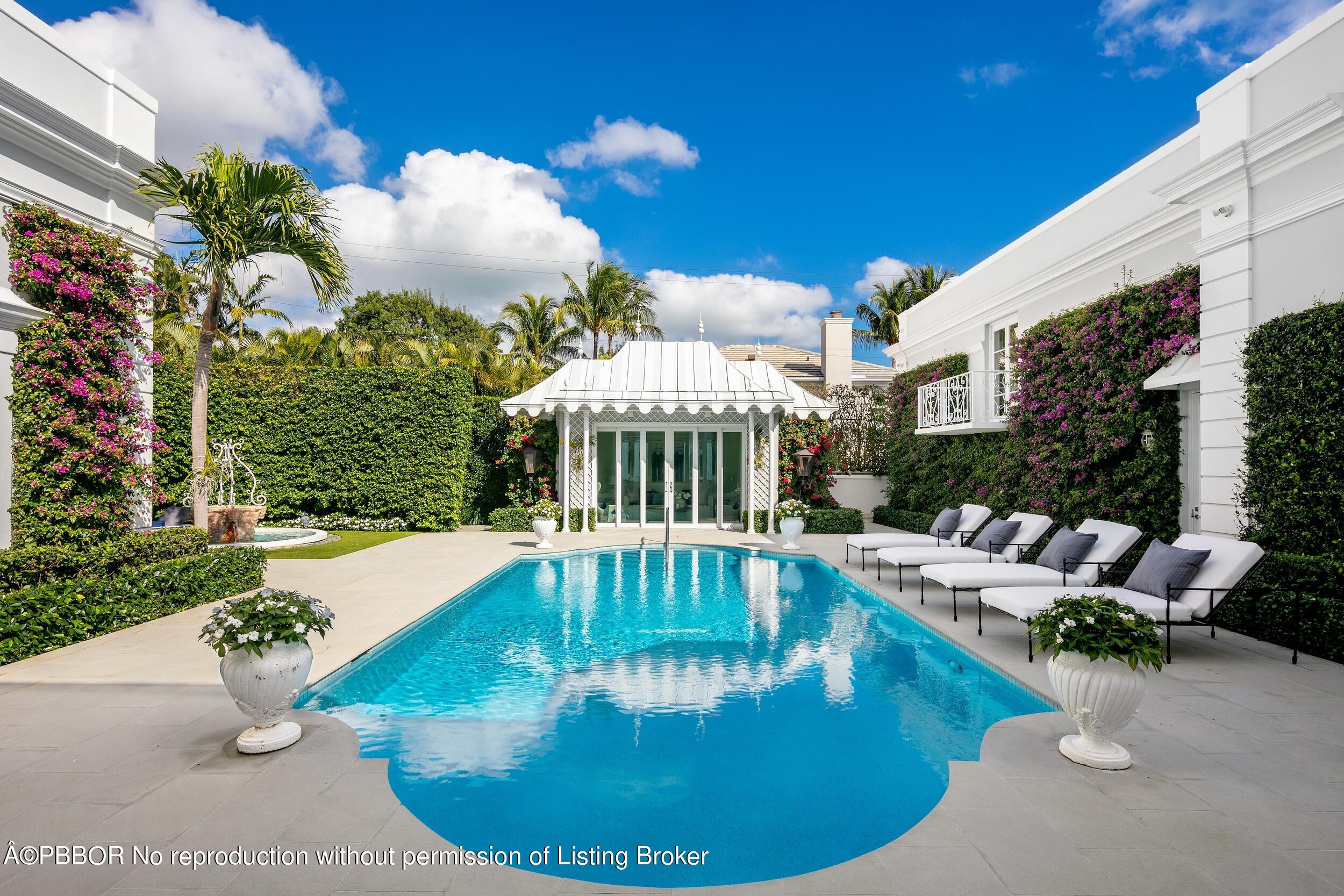 301 Polmer Park Road Palm Beach, FL 33480 - Photo 32 of 43 a view of a swimming pool with sitting area