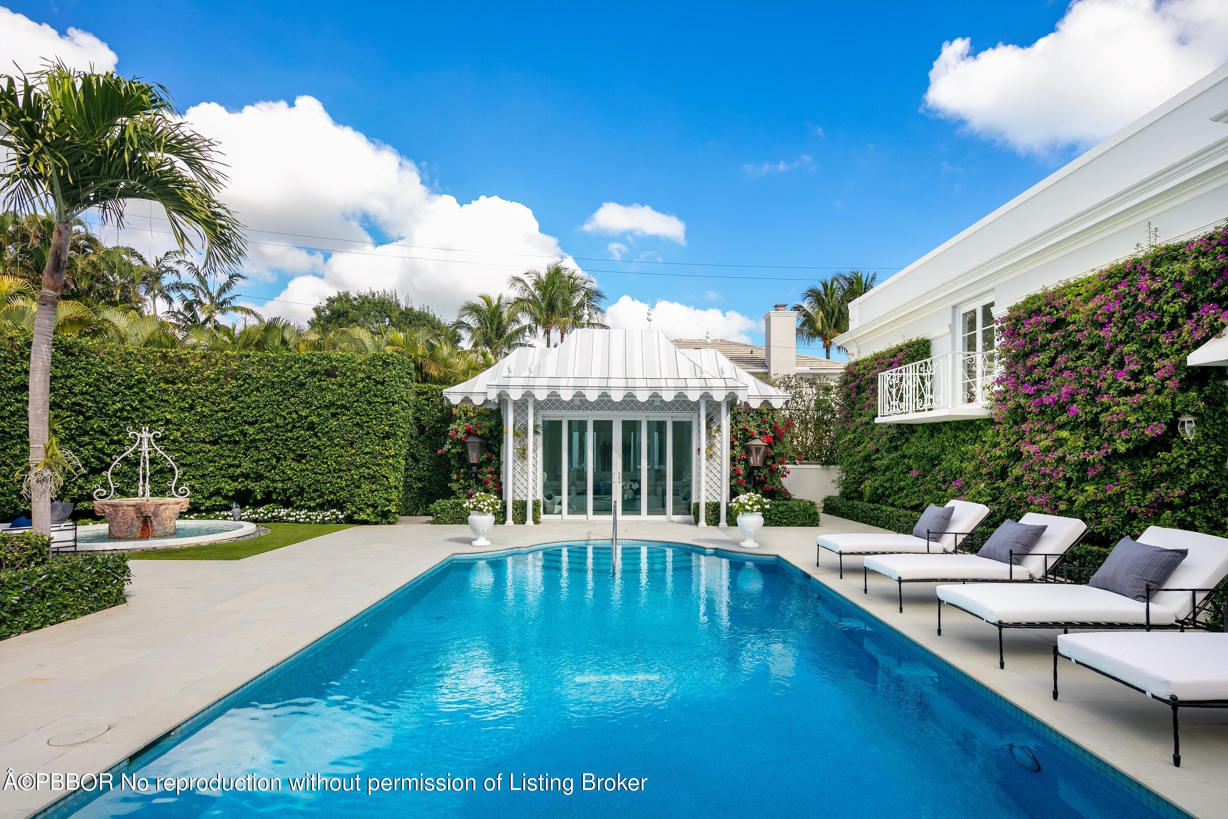 301 Polmer Park Road Palm Beach, FL 33480 - Photo 34 of 43 a view of a house with swimming pool