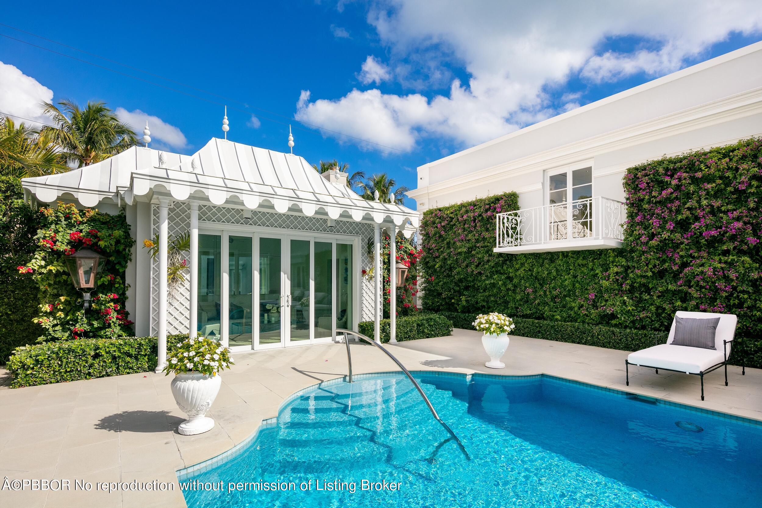 301 Polmer Park Road Palm Beach, FL 33480 - Photo 35 of 43 a front view of a house with a yard