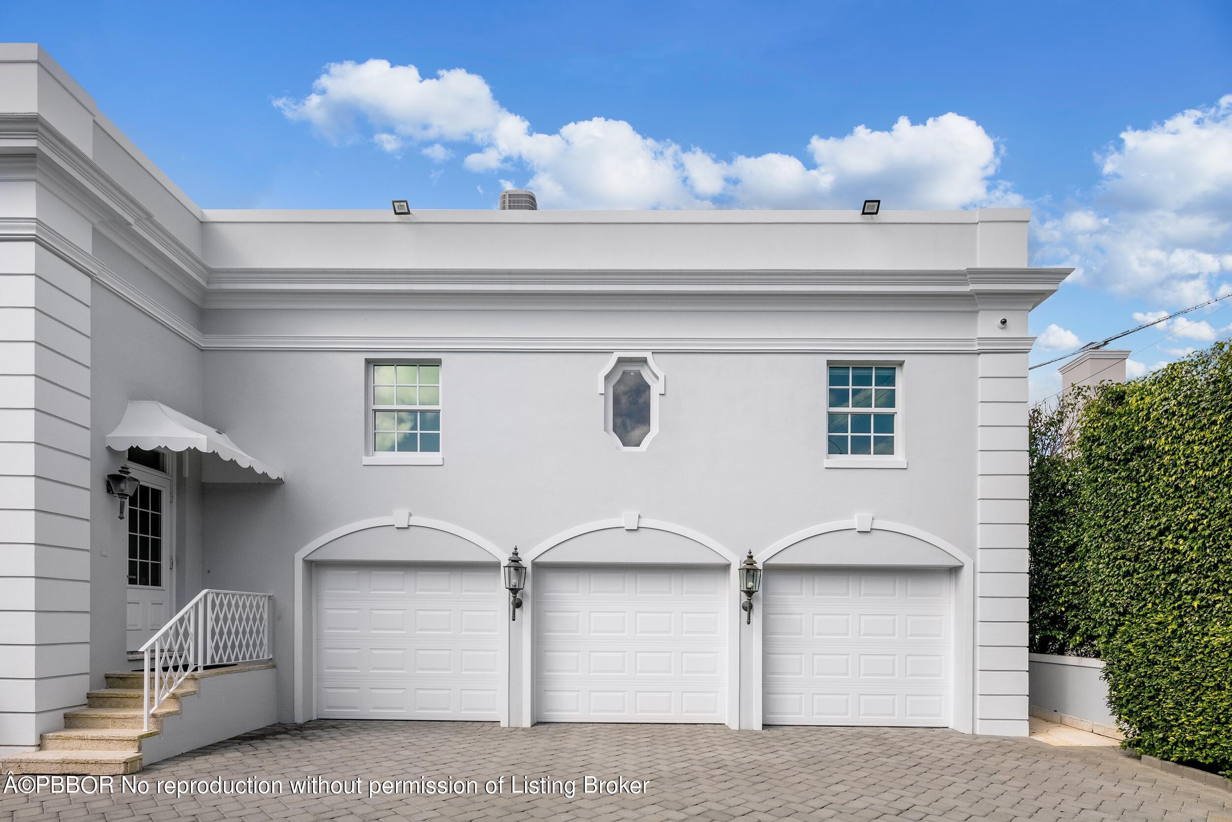 301 Polmer Park Road Palm Beach, FL 33480 - Photo 40 of 43 a front view of a house with plants