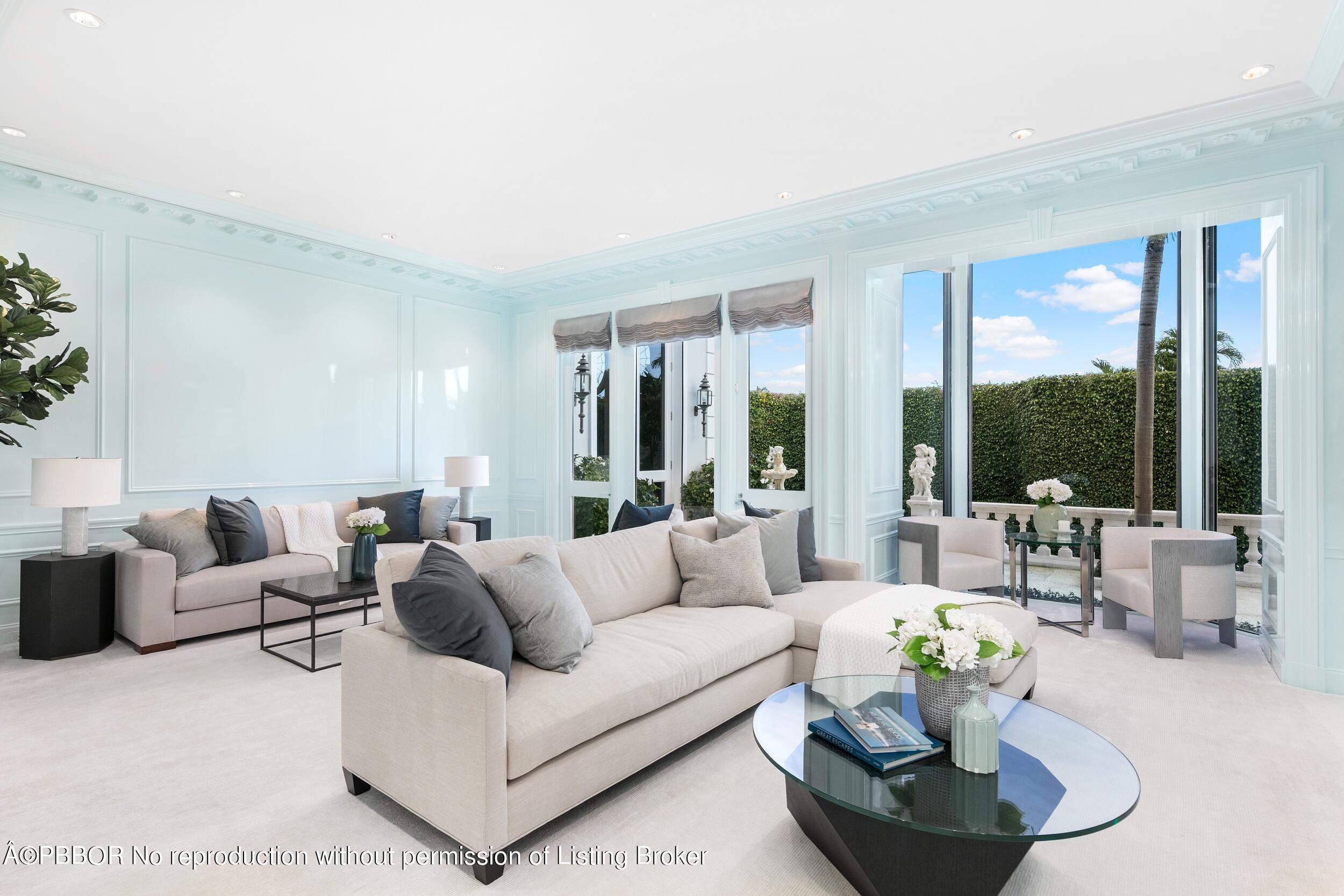 301 Polmer Park Road Palm Beach, FL 33480 - Photo 9 of 43 a living room with furniture and a large window