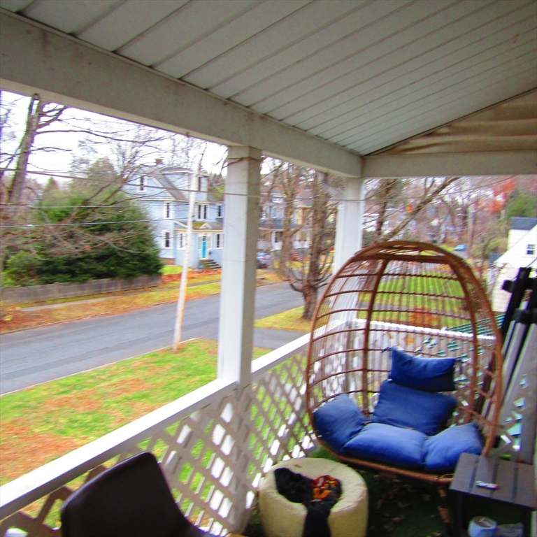 102 Vernon Street, Unit 2 Northampton, MA 01060 - Photo 2 of 7 a view of a living room and floor to ceiling window with an outdoor space