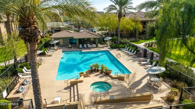 a view of a chairs and table in patio