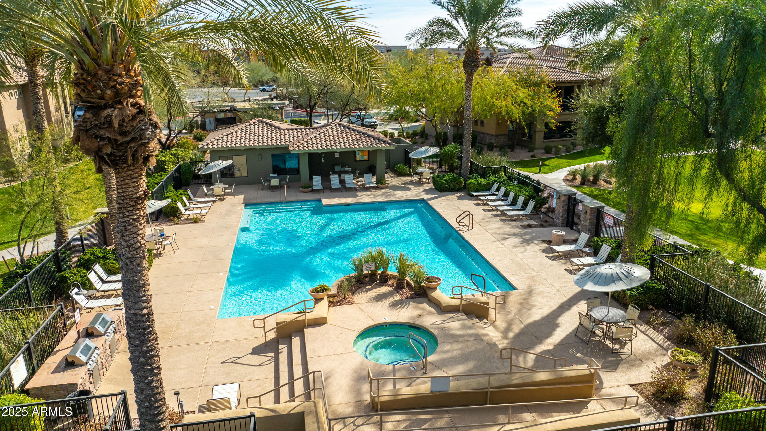 21320 North 56th Street, Unit 2001 Phoenix, AZ 85054 - Photo 35 of 45 a view of a swimming pool with a patio