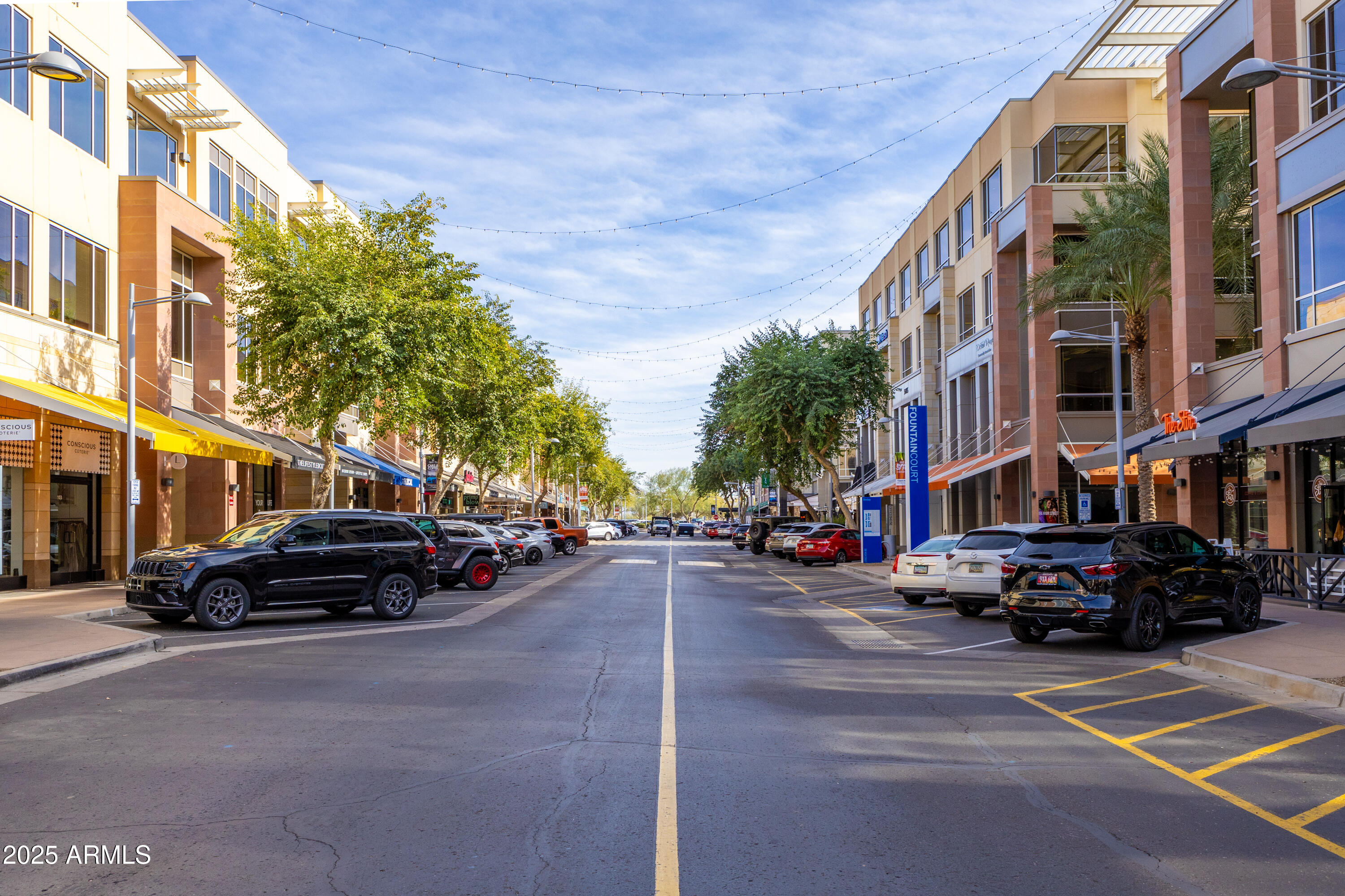21320 North 56th Street, Unit 2001 Phoenix, AZ 85054 - Photo 40 of 45 a car parked in front of a building