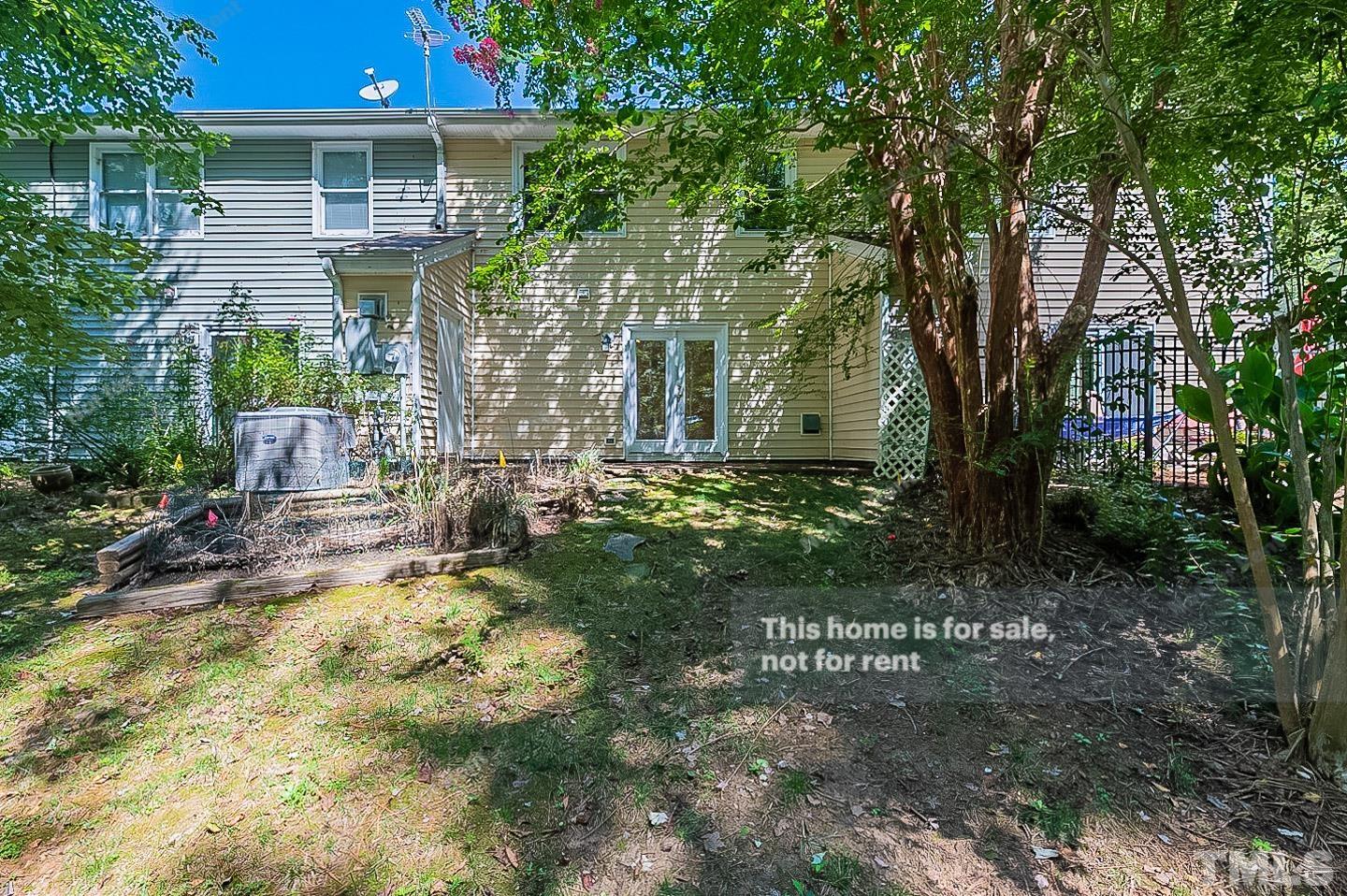 565 Darby Glen Lane Durham, NC 27713 - Photo 18 of 18 a view of a back yard of the house