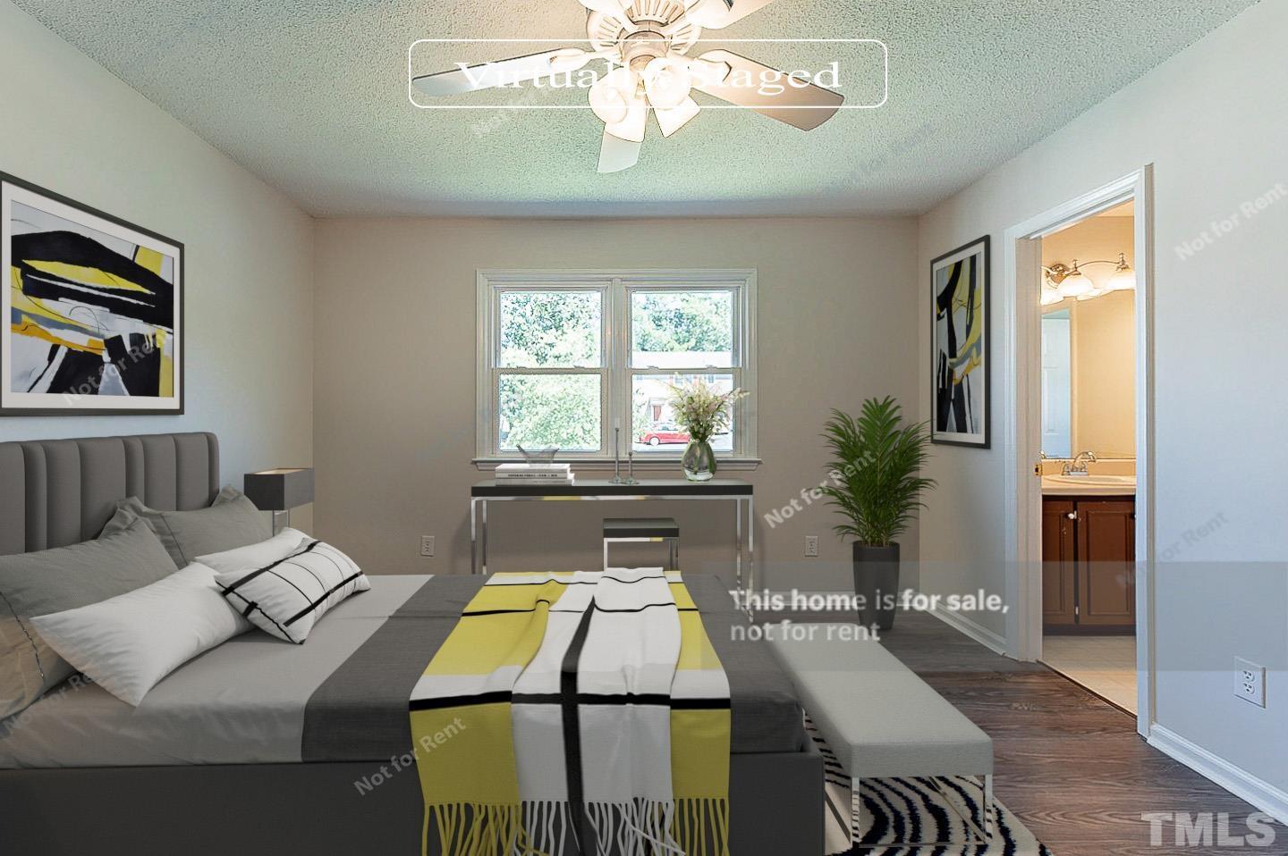 565 Darby Glen Lane Durham, NC 27713 - Photo 9 of 18 a living room with furniture and a chandelier