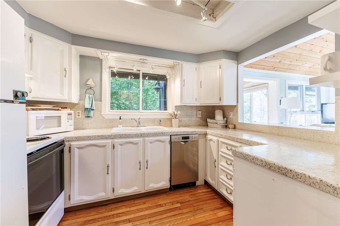 198 East Lake Road Middlesex, NY 14544 - Photo 15 of 50 "WHITE & BRIGHT" KITCHEN OPEN TO LIVING AREA WITH
