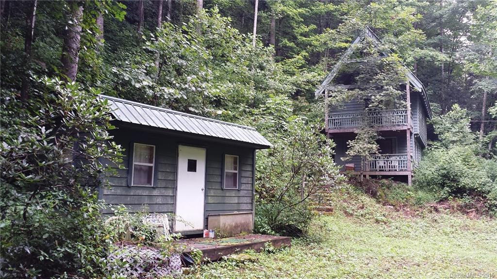 1083 Big Creek Road Marshall, NC 28753 - Photo 19 of 23 front view of a house with a tree