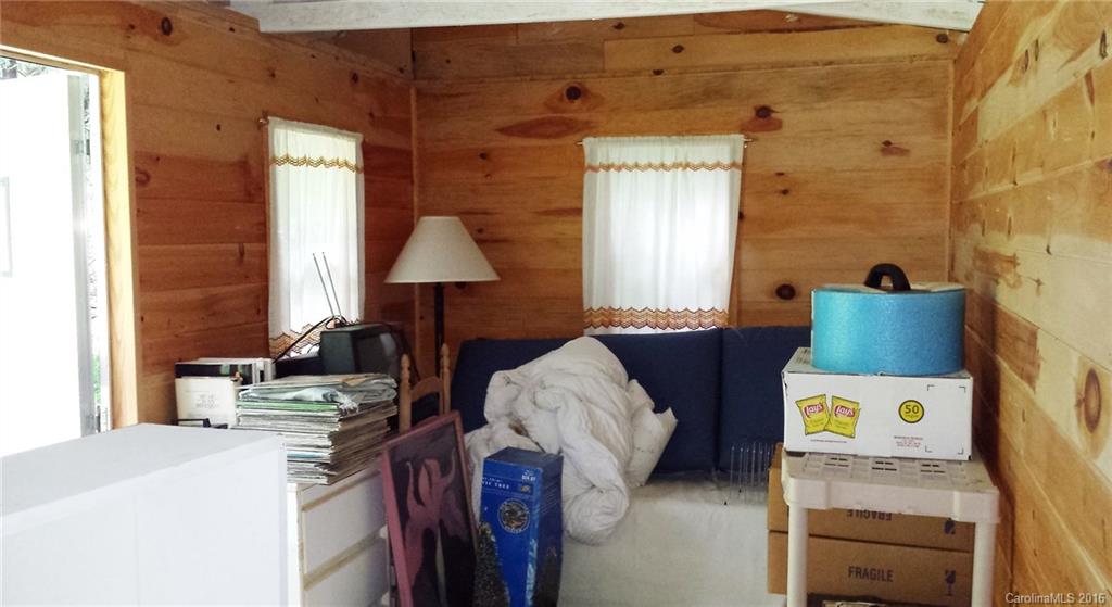 1083 Big Creek Road Marshall, NC 28753 - Photo 20 of 23 a bedroom with bed and a window
