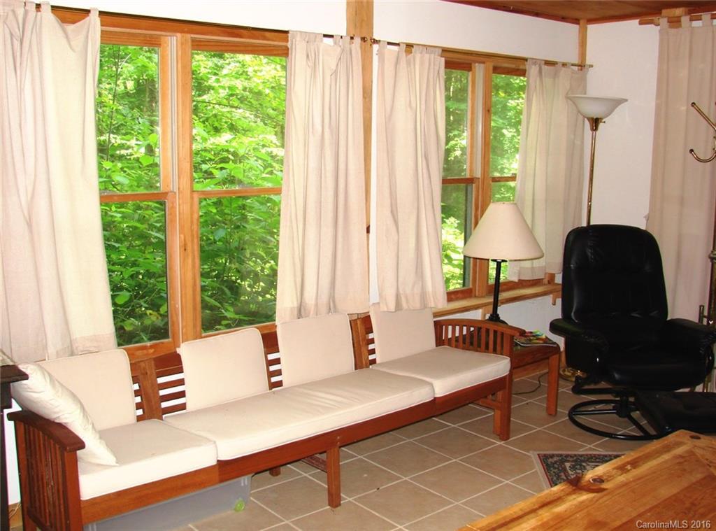 1083 Big Creek Road Marshall, NC 28753 - Photo 7 of 23 a living room with furniture and a window
