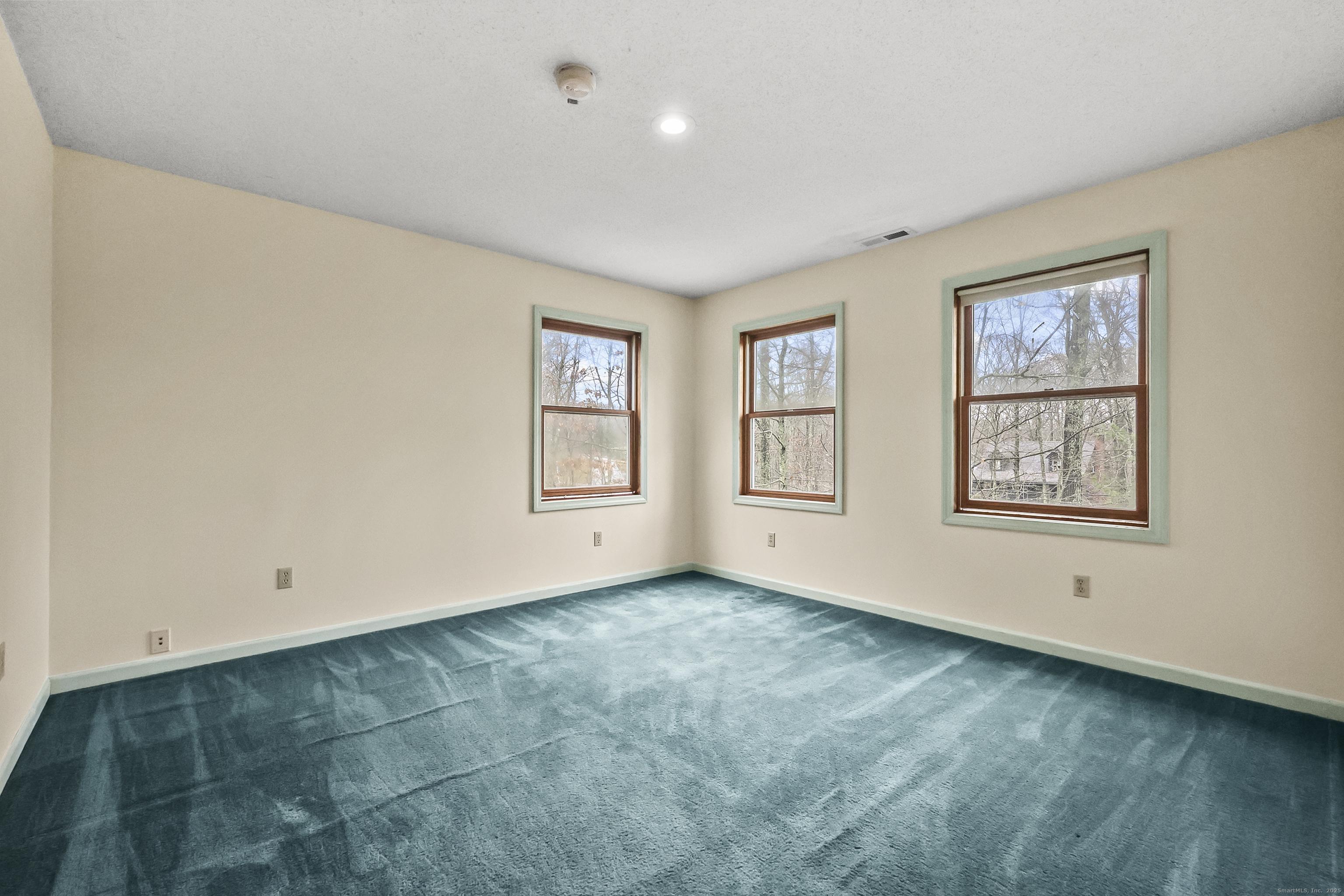 111 Bascom Road Lebanon, CT 06249 - Photo 11 of 30 a view of an empty room with a window