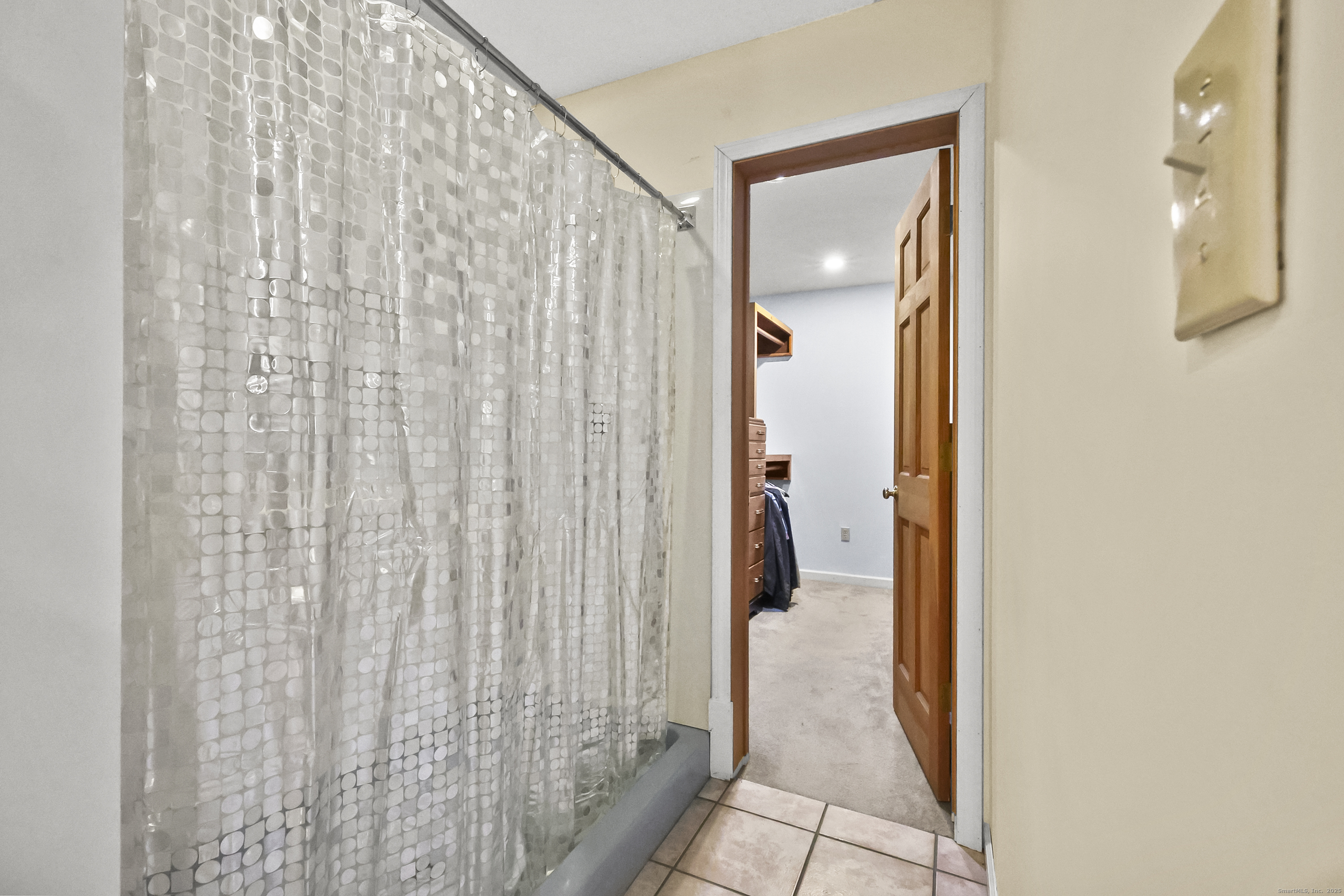 111 Bascom Road Lebanon, CT 06249 - Photo 13 of 30 a bathroom with a shower and a sink