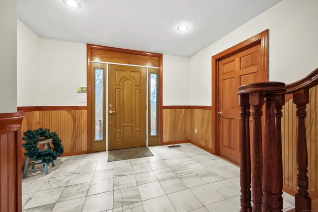 a view of a hallway with closet