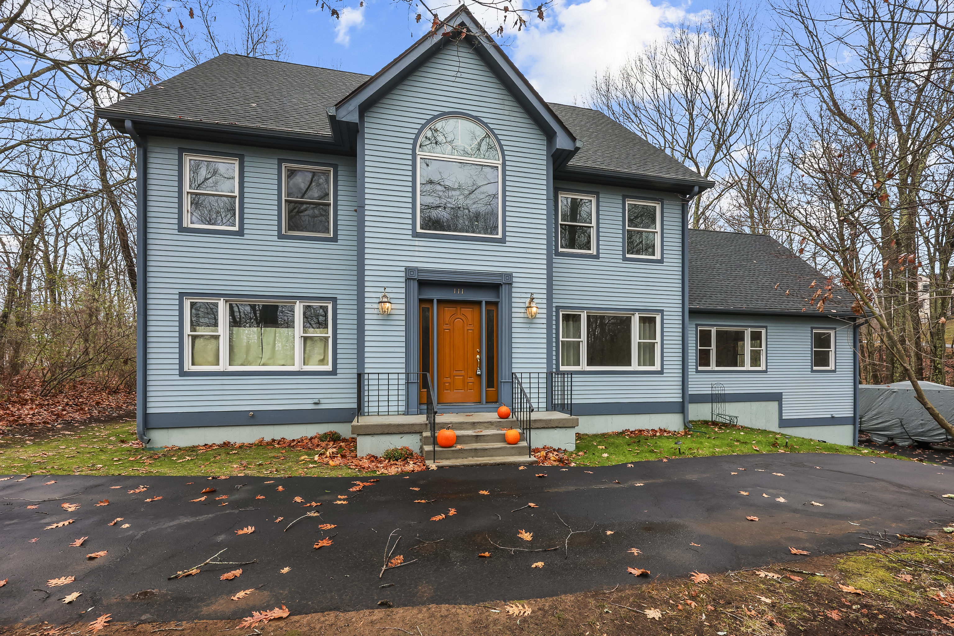 111 Bascom Road Lebanon, CT 06249 - Photo 5 of 30 a front view of a house with yard