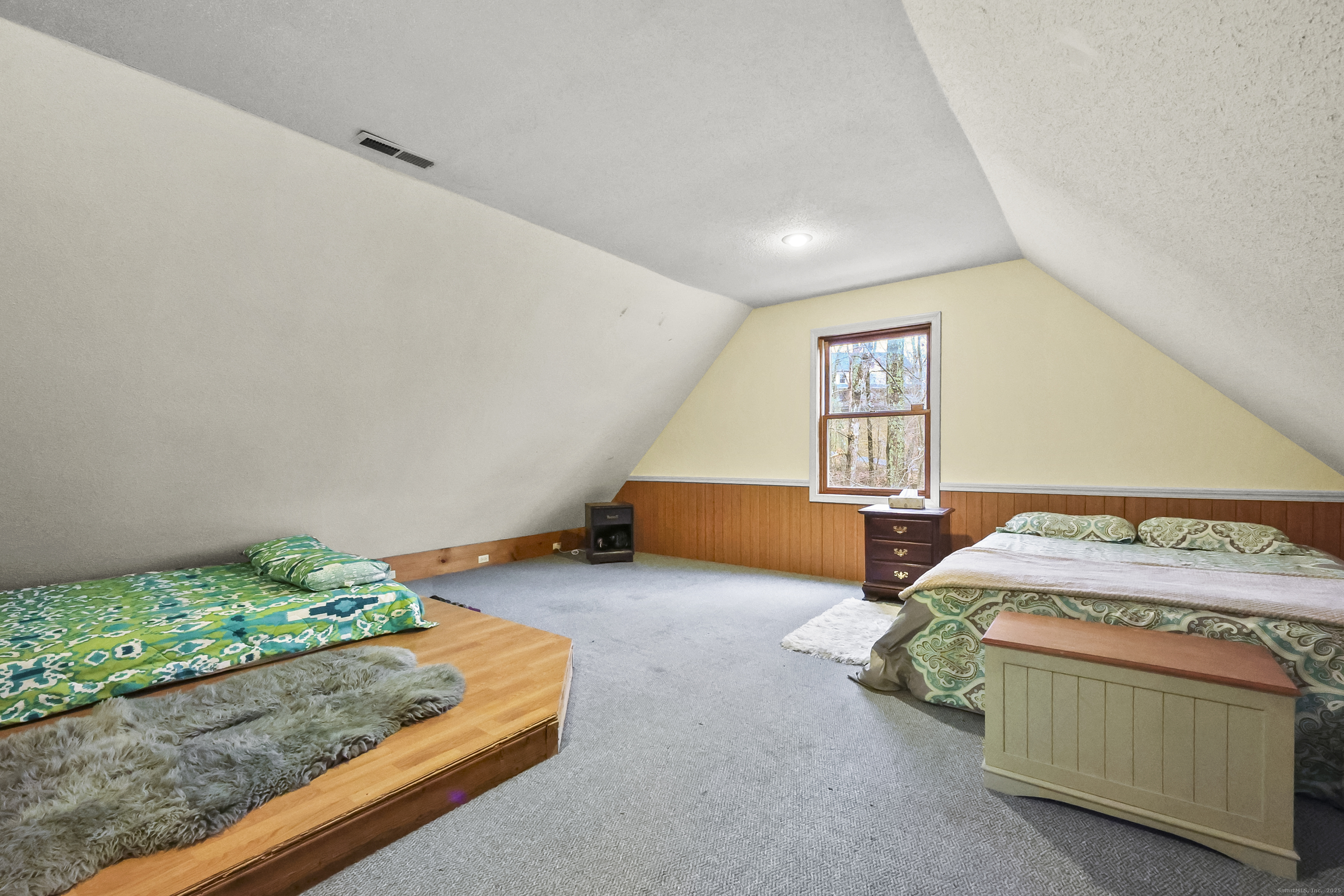 111 Bascom Road Lebanon, CT 06249 - Photo 8 of 30 a bedroom with bed and window