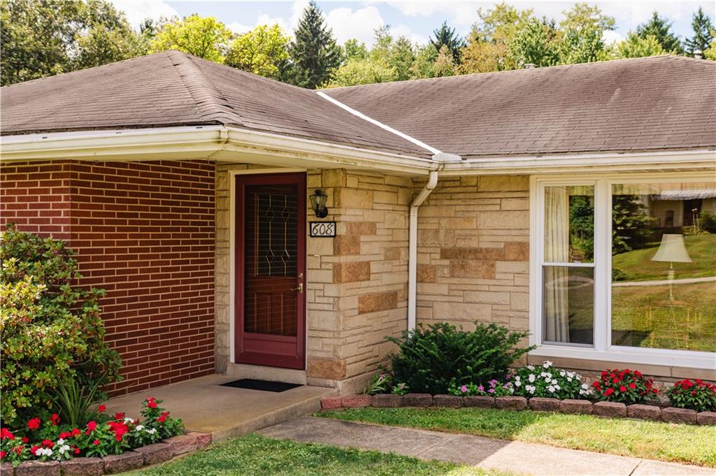 608 Edgewood Drive Apollo, PA 15613 - Photo 2 of 40 a view of a house with brick walls and a yard