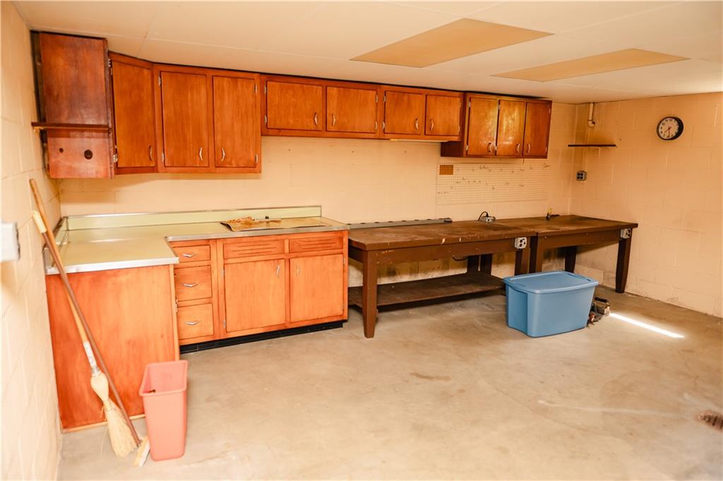 608 Edgewood Drive Apollo, PA 15613 - Photo 32 of 40 a kitchen with stainless steel appliances granite countertop a stove a sink and a microwave