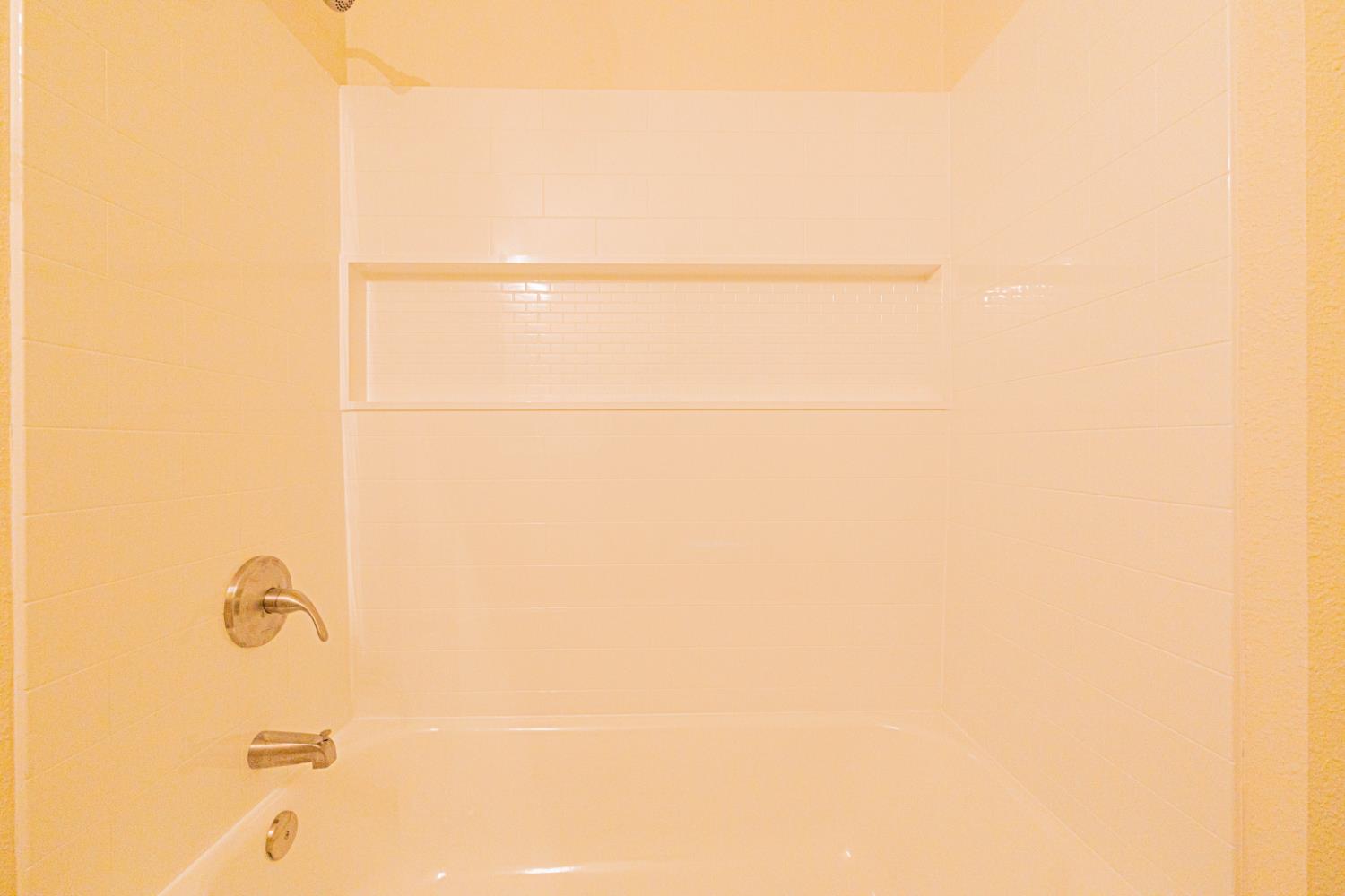 17925 Rodeo Drive Madera, CA 93638 - Photo 15 of 26 a bathroom with a shower