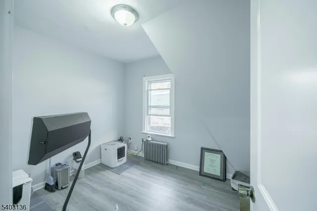 a utility room with cabinets dryer and washer
