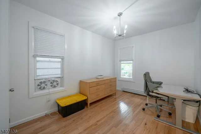 a workspace with furniture and window