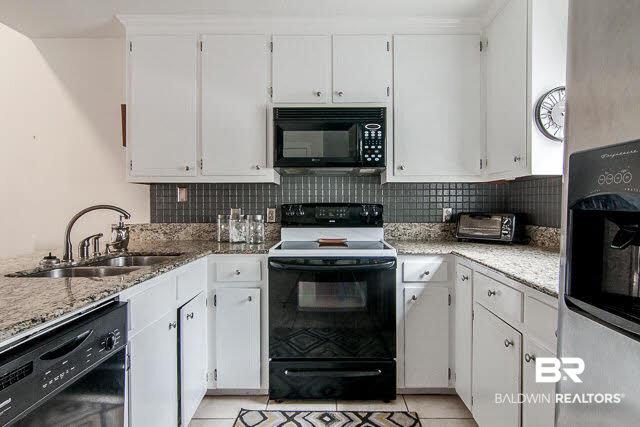 200 Parma Drive, Unit I2 Daphne, AL 36526 - Photo 11 of 23 Black and Stainless Steel Appliances