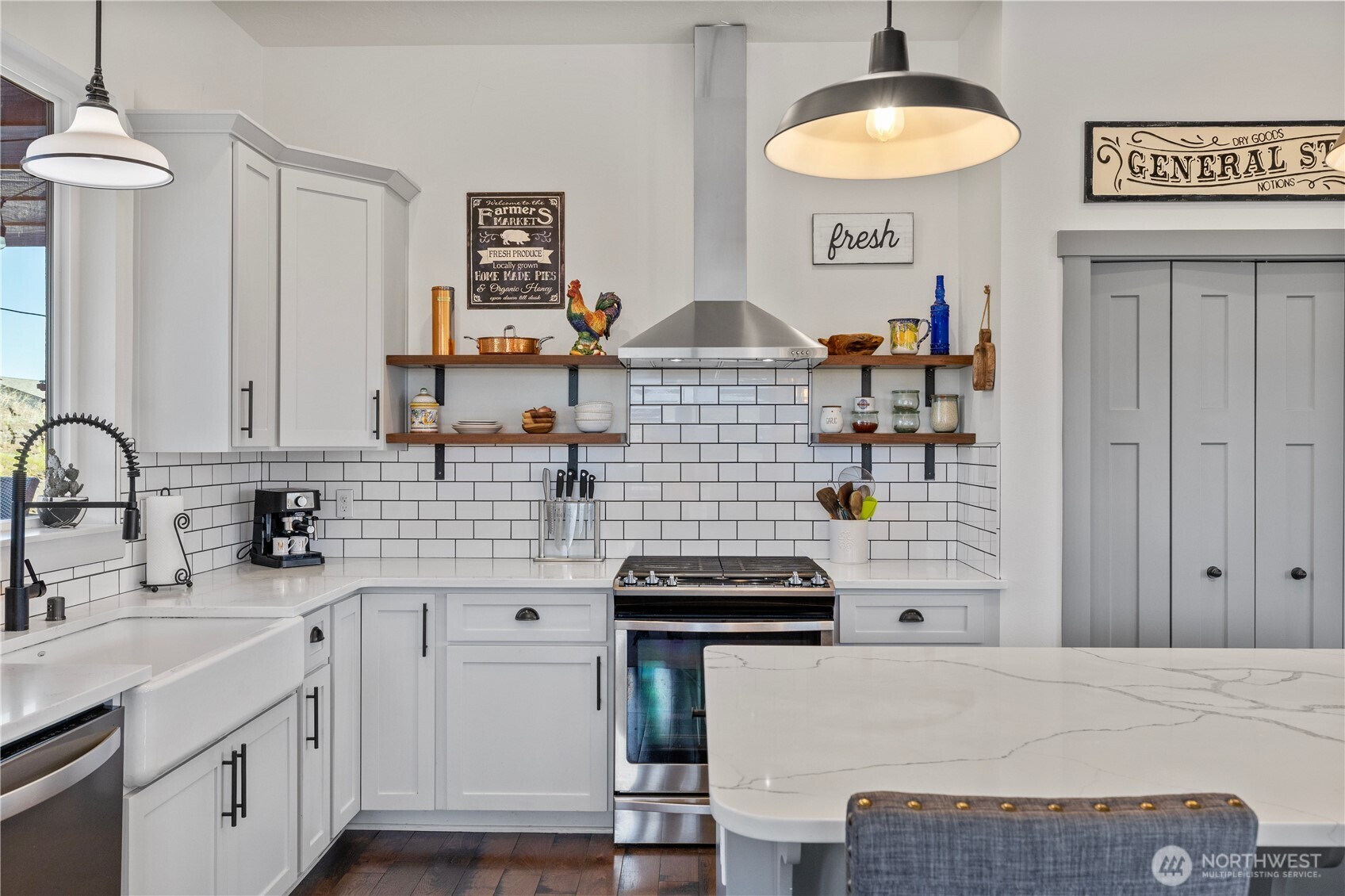 714 Sunset Boulevard Mattawa, WA 99349 - Photo 15 of 40 a kitchen with a sink and a stove