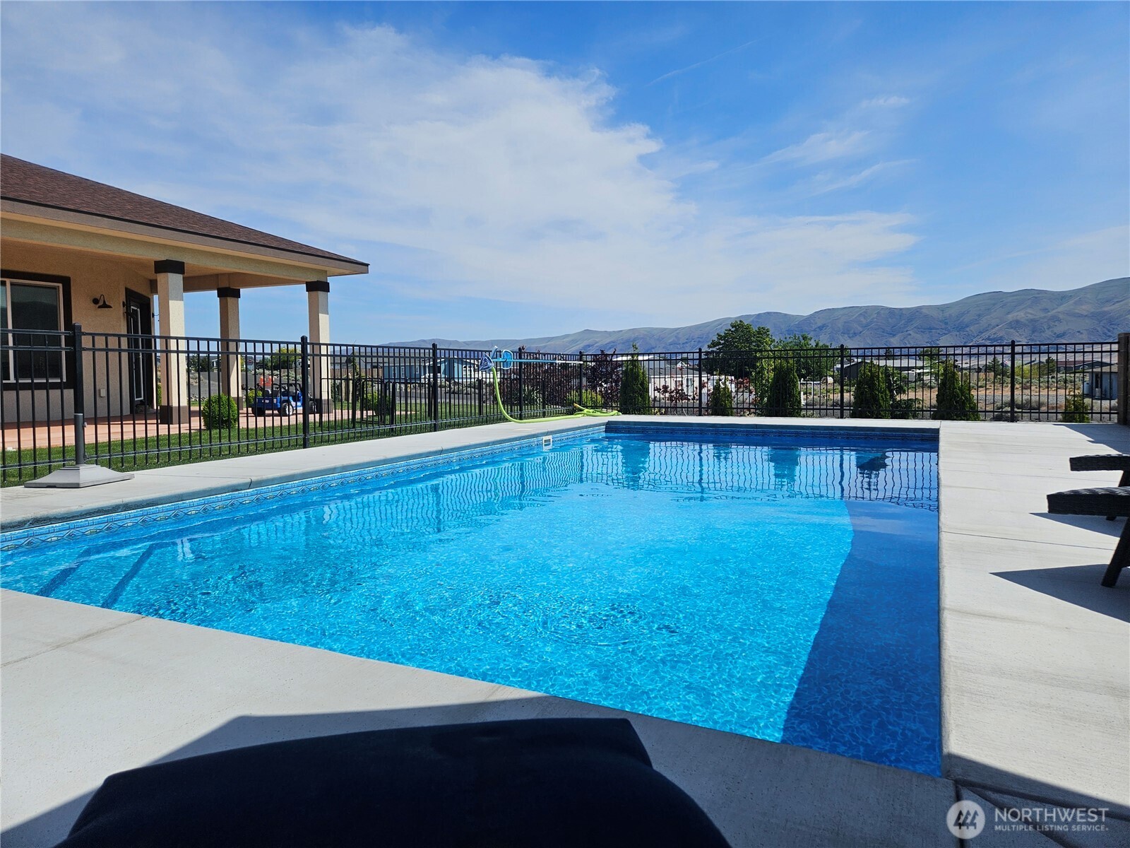 714 Sunset Boulevard Mattawa, WA 99349 - Photo 19 of 40 a view of a swimming pool with an outdoor seating