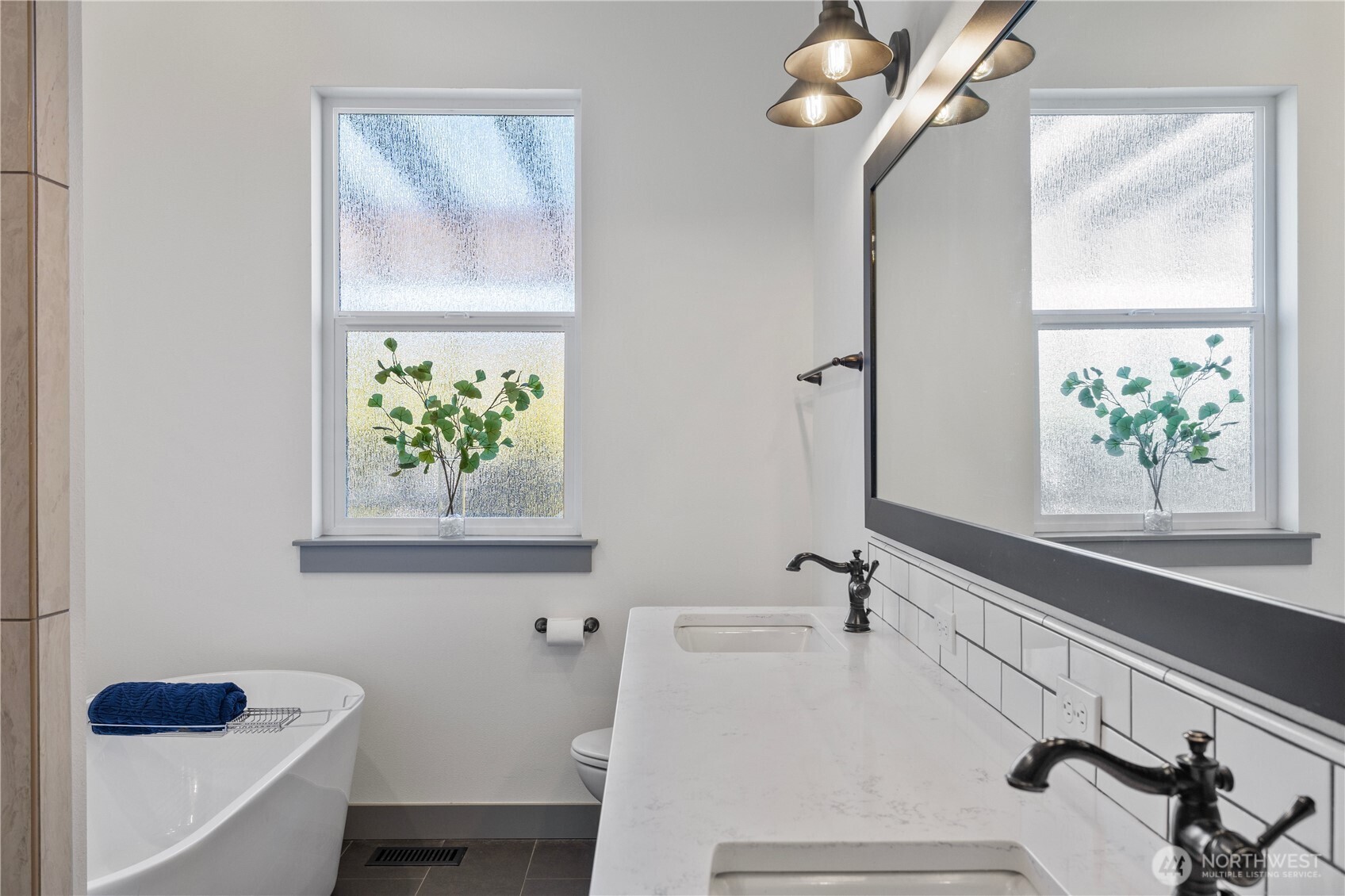 714 Sunset Boulevard Mattawa, WA 99349 - Photo 24 of 40 a bathroom with a sink a toilet and a window