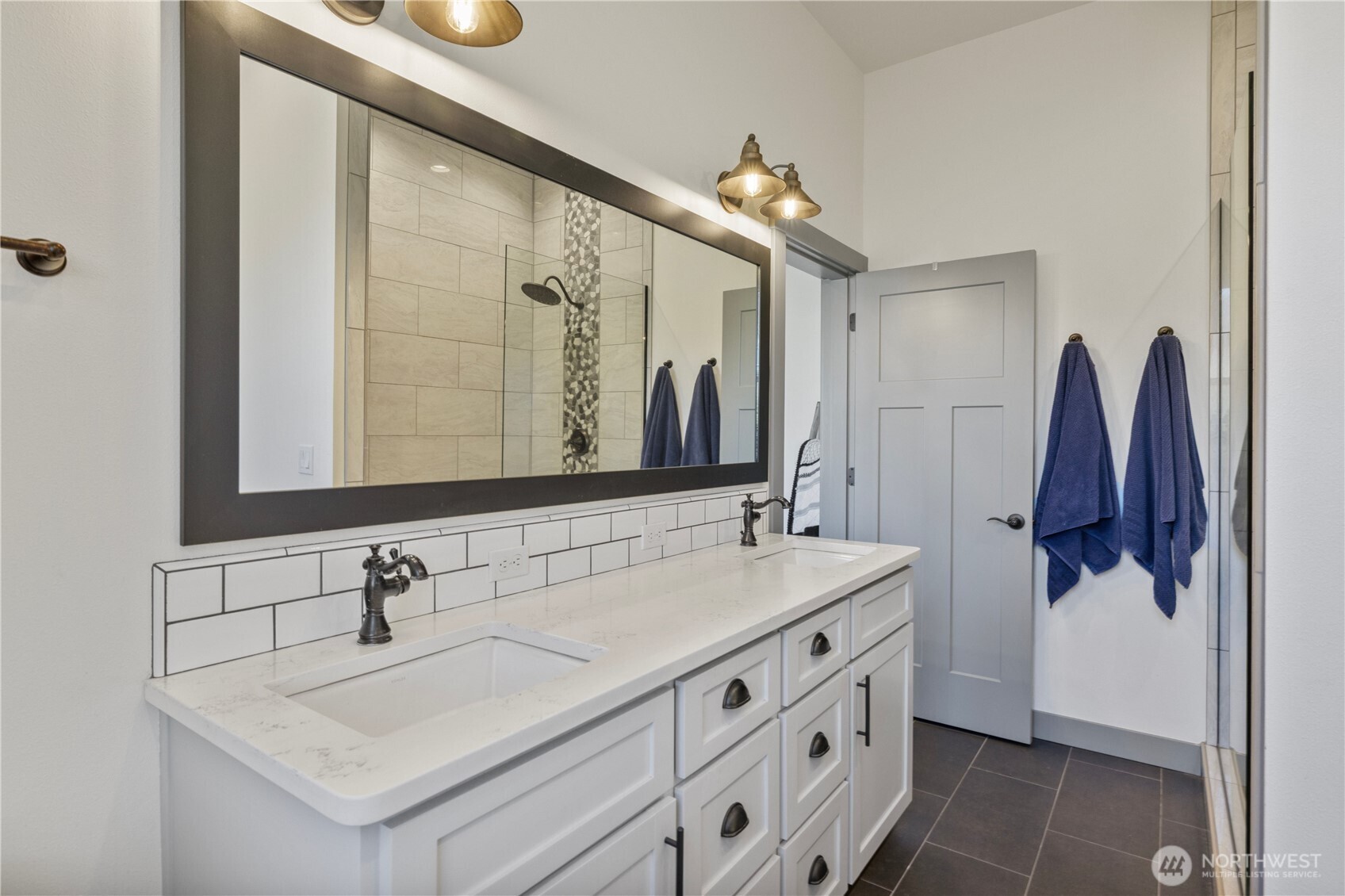 714 Sunset Boulevard Mattawa, WA 99349 - Photo 27 of 40 a bathroom with a sink vanity and a mirror