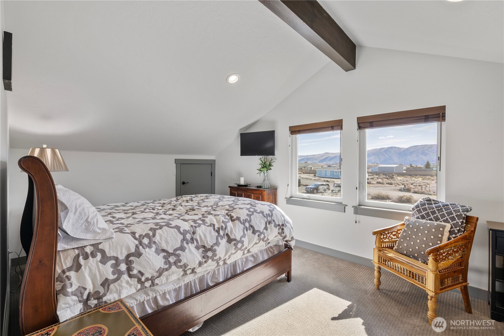 714 Sunset Boulevard Mattawa, WA 99349 - Photo 32 of 40 a bedroom with a bed and wooden floor