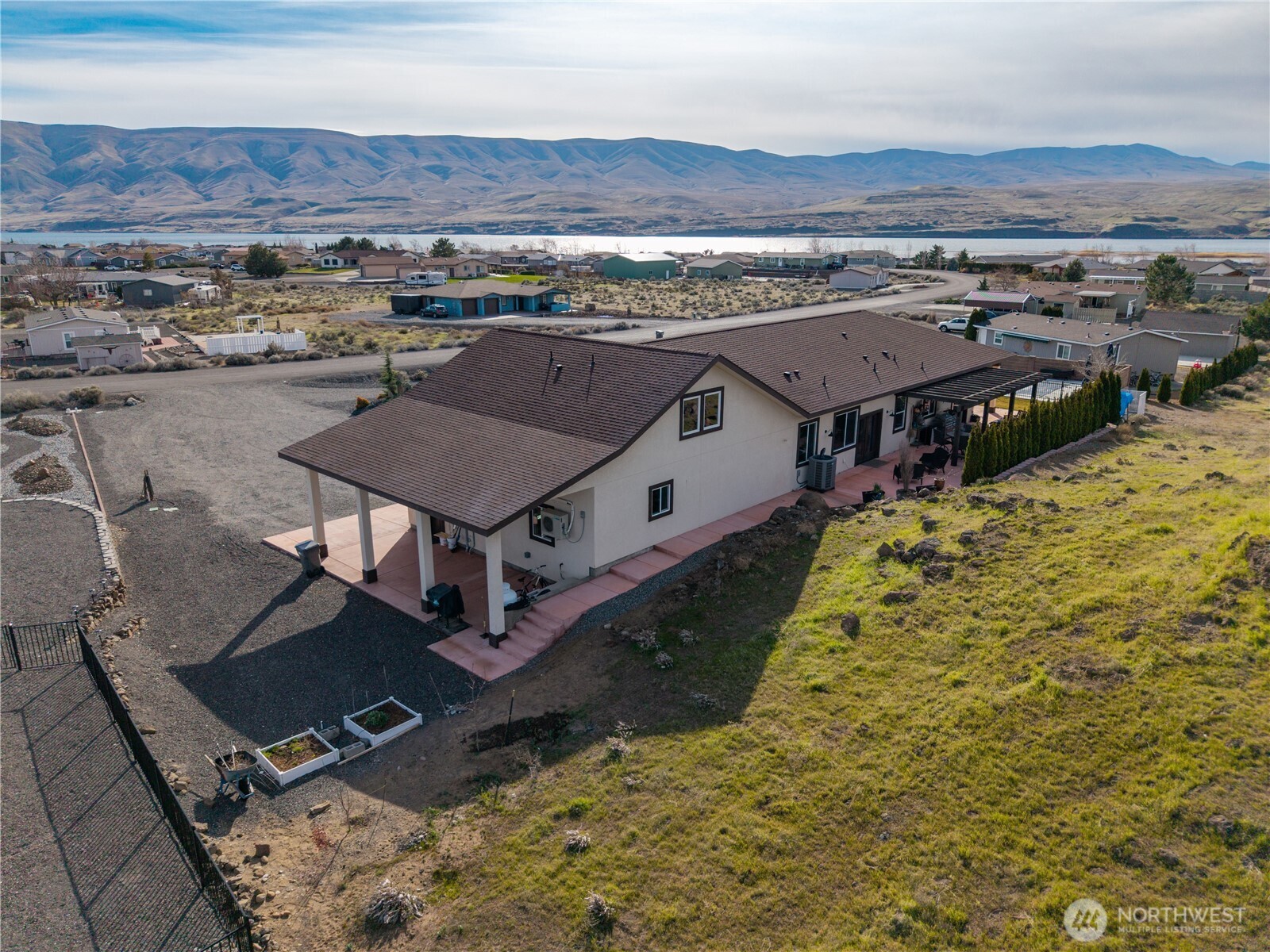 714 Sunset Boulevard Mattawa, WA 99349 - Photo 35 of 40 an aerial view of houses with a yard