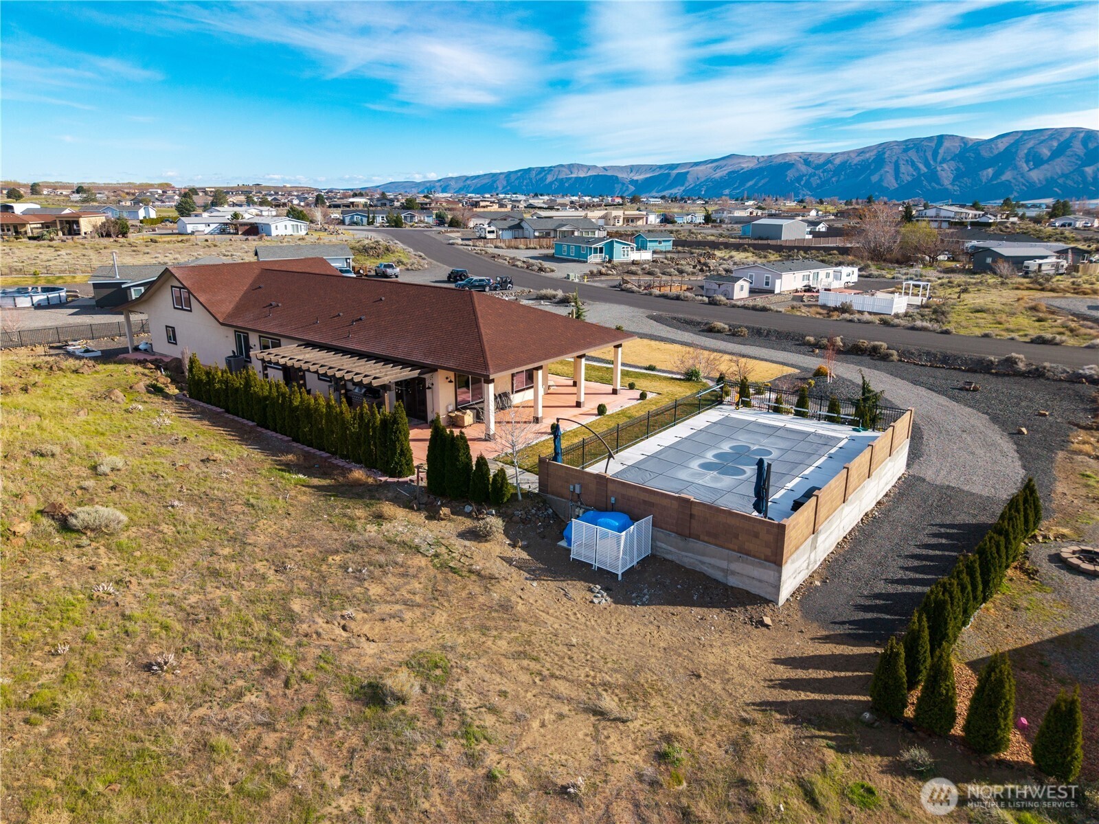 714 Sunset Boulevard Mattawa, WA 99349 - Photo 36 of 40 an aerial view of a house with a swimming pool