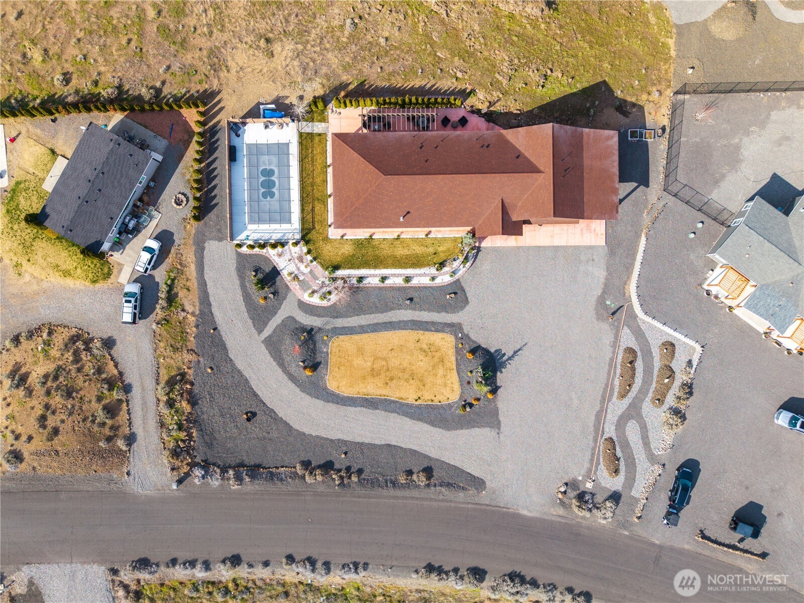 714 Sunset Boulevard Mattawa, WA 99349 - Photo 39 of 40 an aerial view of a house with a swimming pool