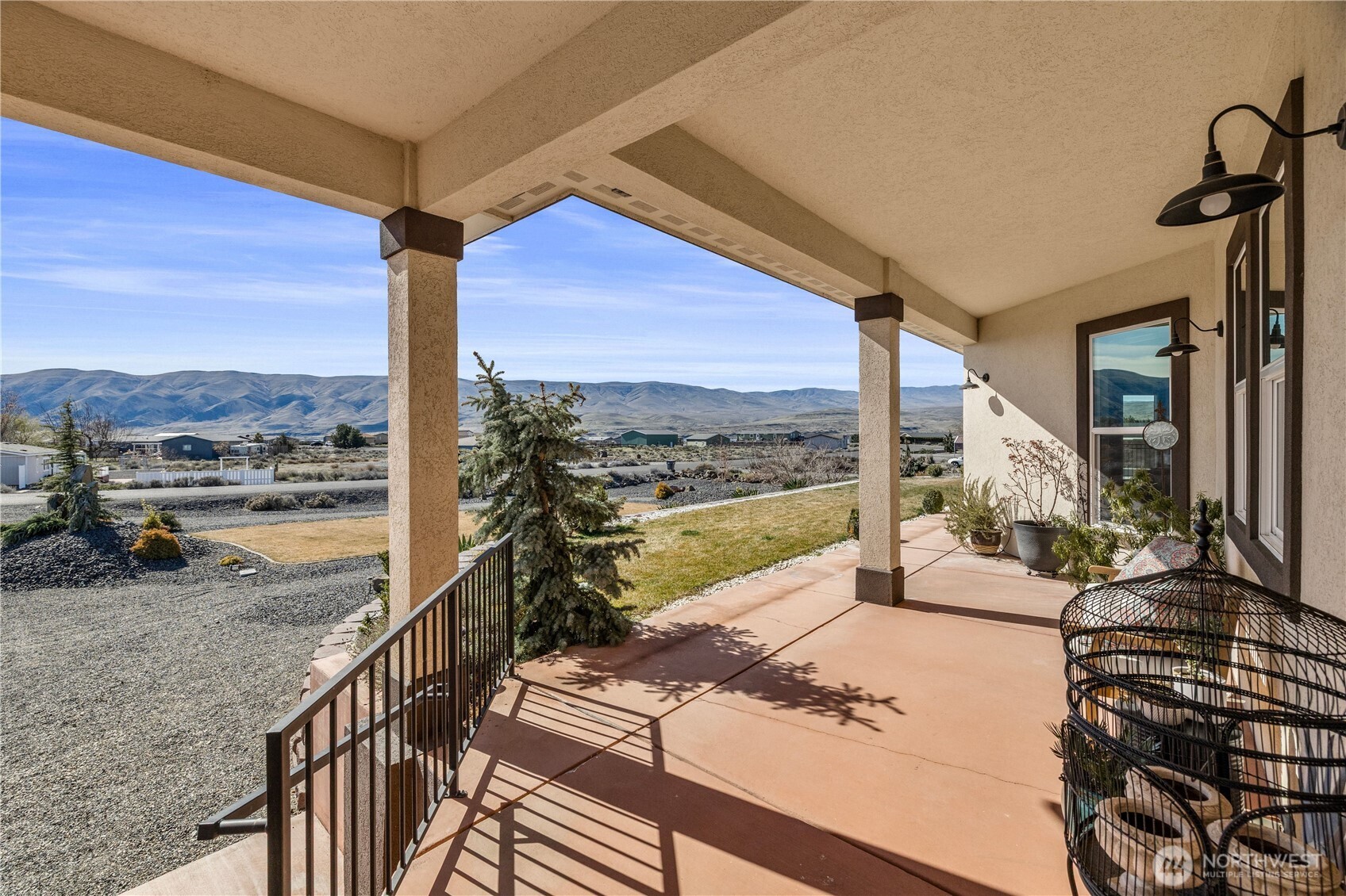 714 Sunset Boulevard Mattawa, WA 99349 - Photo 5 of 40 a view of a balcony with lake view and a floor to ceiling window