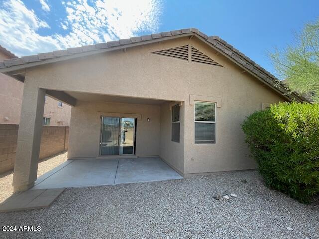 8478 West Maya Drive Peoria, AZ 85383 - Photo 5 of 6 a view of a house with a yard