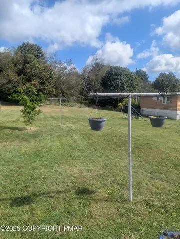 a view of a wooden floor and a yard
