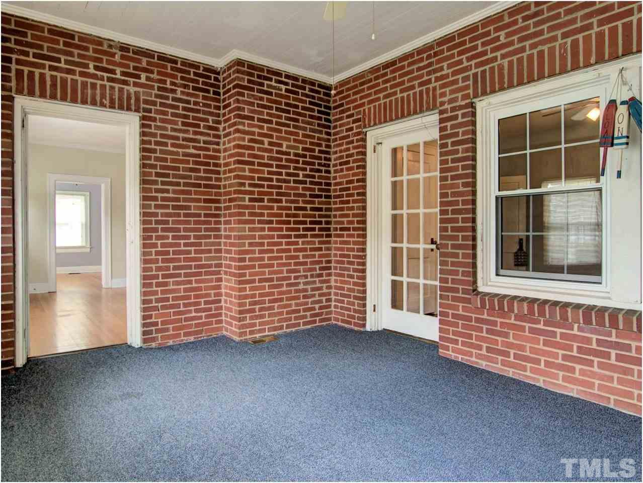 6708 Dwight Rowland Road Willow Spring, NC 27592 - Photo 16 of 20 This home is light and bright, and offers lots of space for entertaining. If I owned this house, I'd make this a TV or bonus type room. What would you do with it? Check out those cool brick walls!