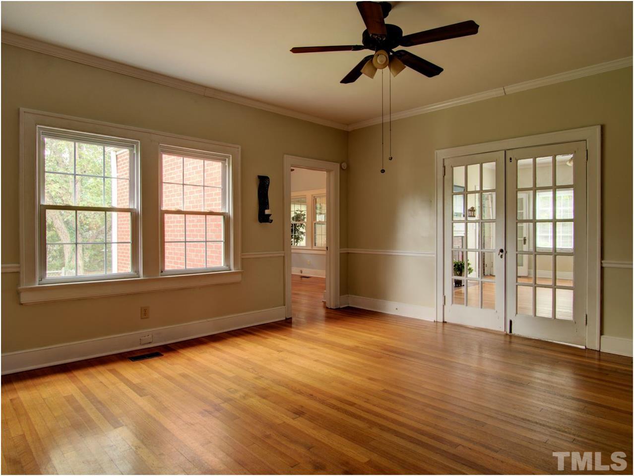 6708 Dwight Rowland Road Willow Spring, NC 27592 - Photo 6 of 20 Large dining room with French doors closed to the living room