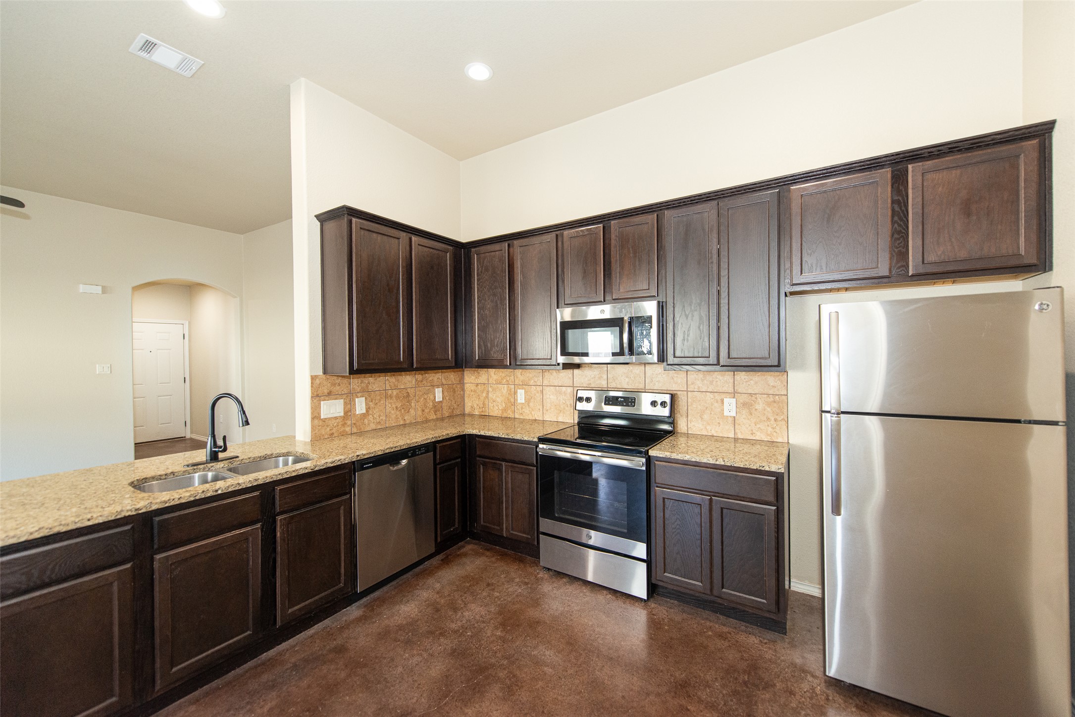 245 Joanne Loop, Unit B Buda, TX 78610 - Photo 7 of 33 Lots of counter and cabinet space