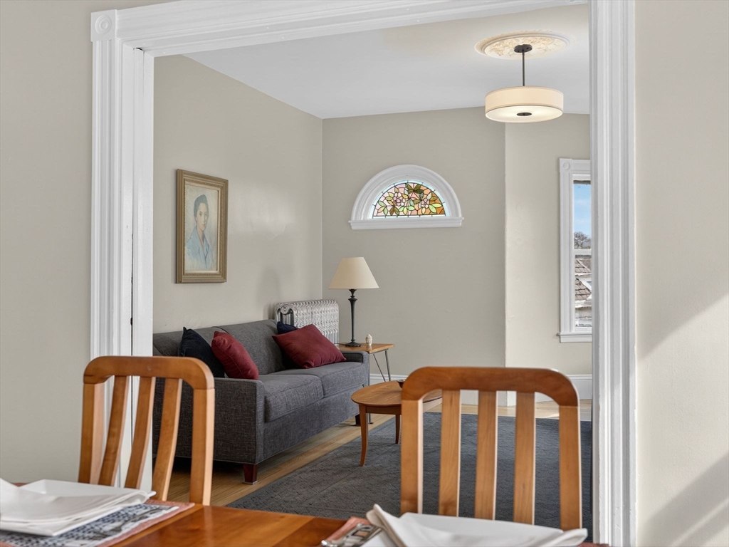 25 Danforth Street, Unit 3 Boston, MA 02130 - Photo 8 of 38 a bedroom with a bed and wooden floor