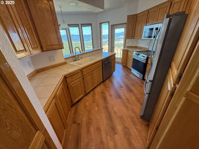 a view of a living room and bathroom