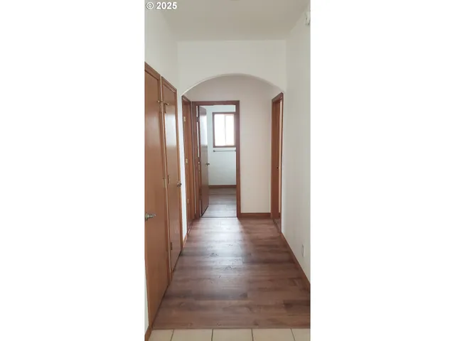 a view of a room that has a window in it