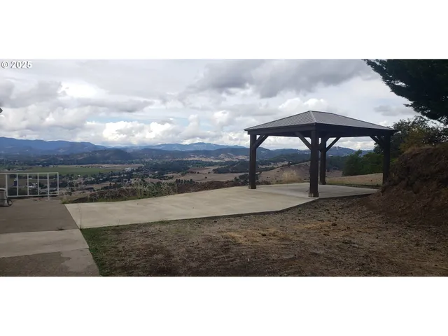 a work room with furniture and a window